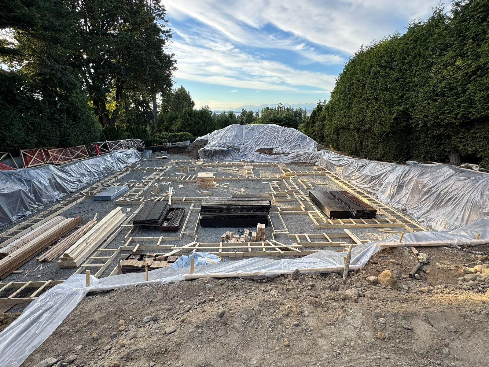 Wide view of a residential foundation layout under construction