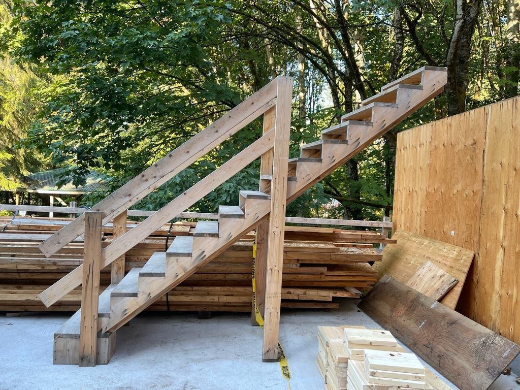 Wooden stairs and temporary framing on a residential site