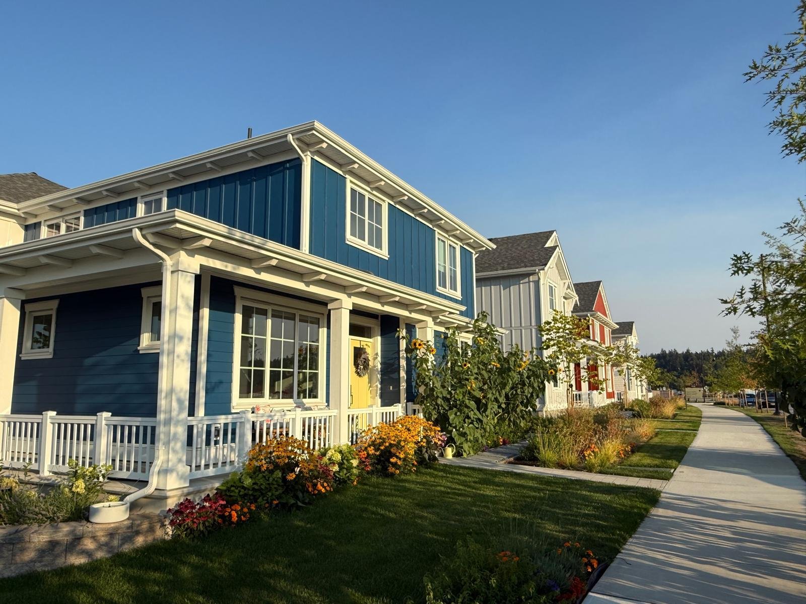 Residential homes along a completed townhouse development